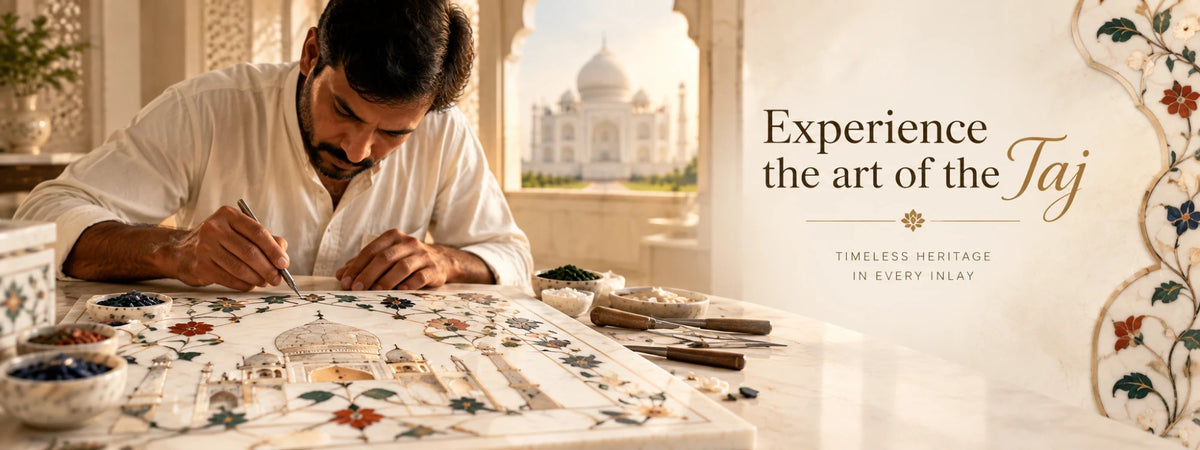Experience the art of the Taj. An artisan sets coloured stones into a white marble tray with the Taj Mahal visible behind him.